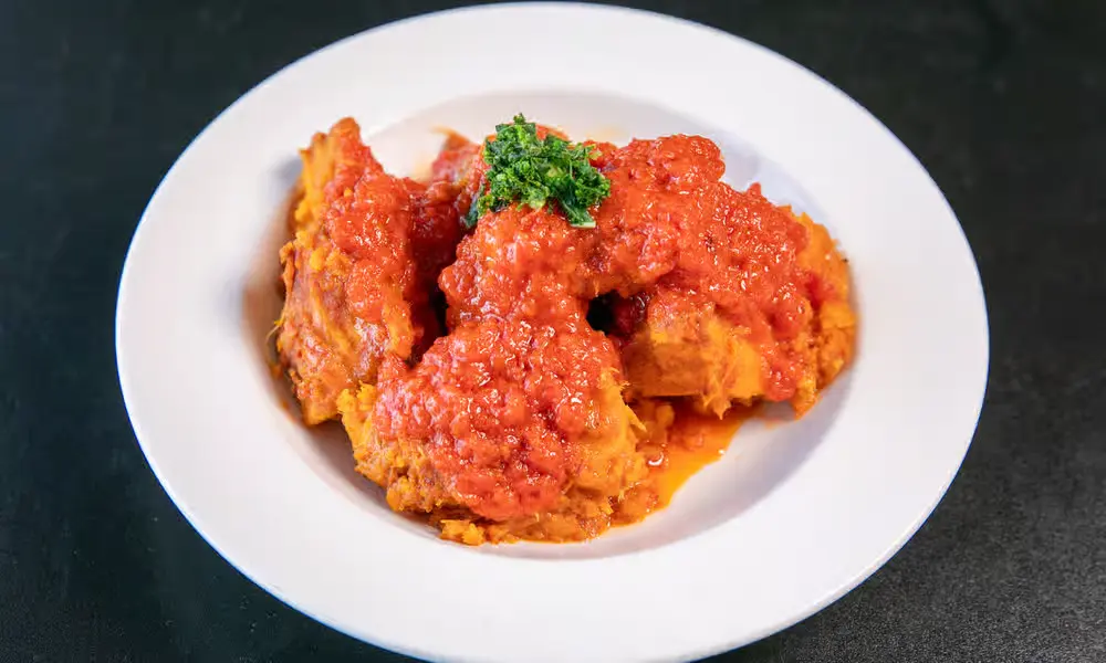 Jollof rice and West African dishes at Global Pot Fusion Cuisine in Winnipeg, MB